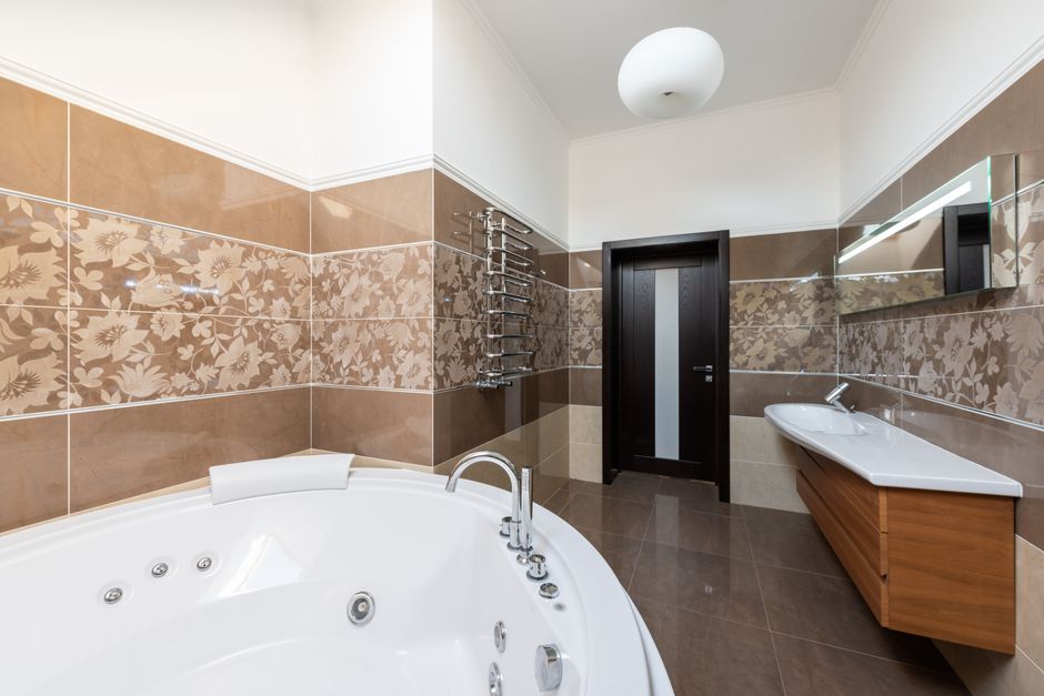 Luxury bathroom interior featuring elegant tile work and fixtures
